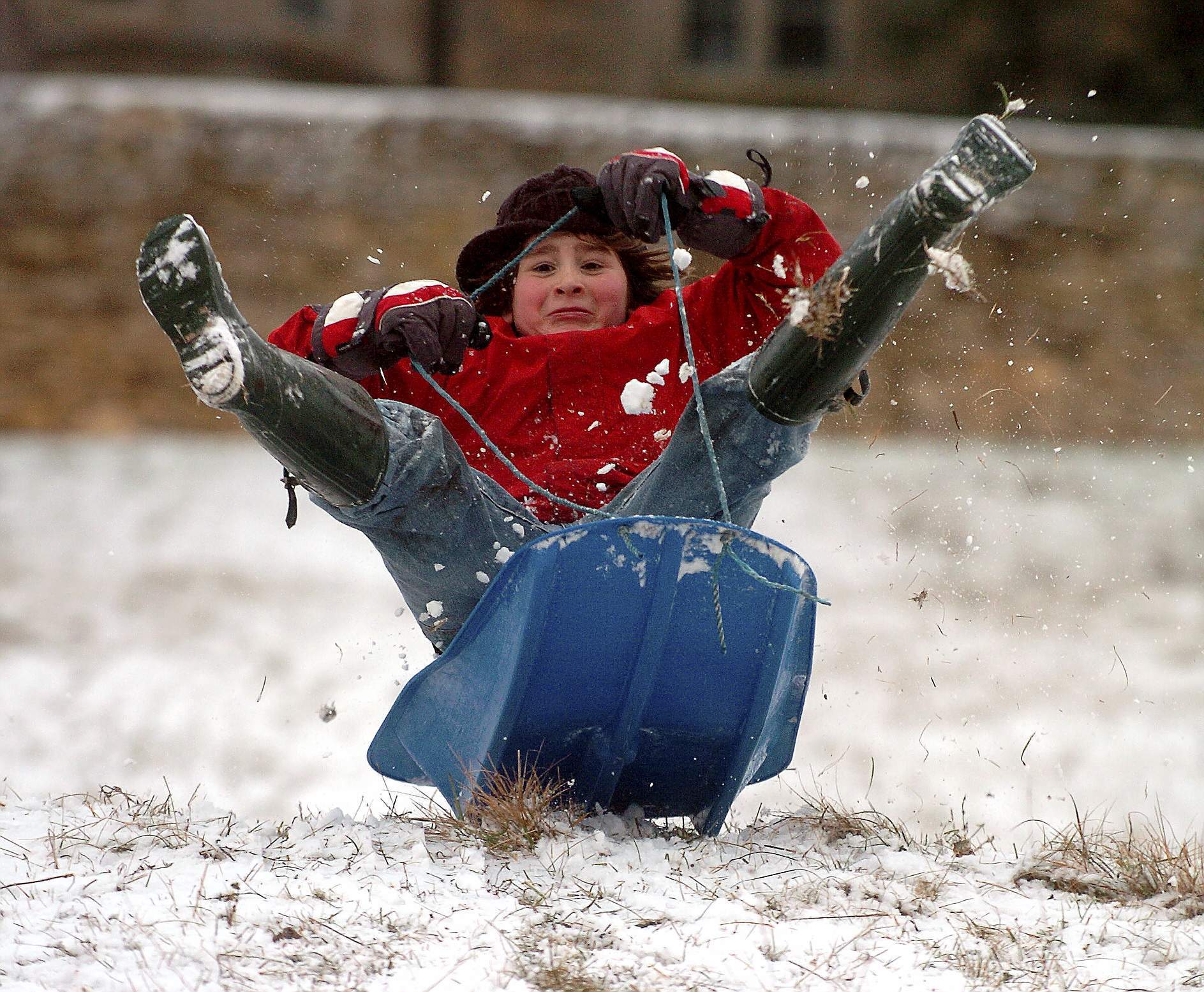 KID SLEDGING SNOW